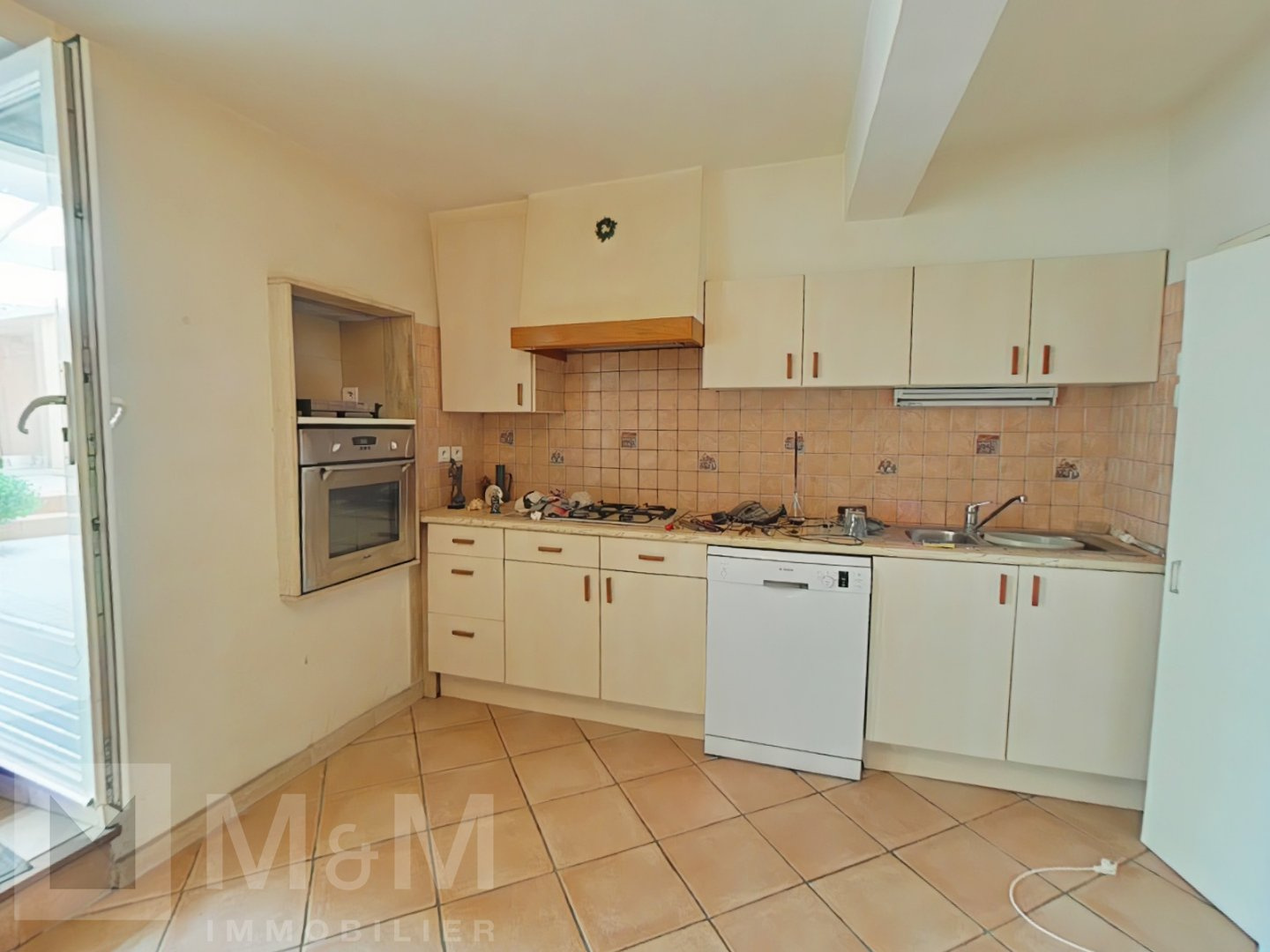 Maison d'environ 110m2 habitable avec une cour intérieure de